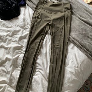 army green lululemon leggings. small hole in crotch area.